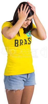 Upset football fan in brasil tshirt