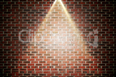 Red brick wall under spotlight