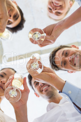 Casual business team toasting with champagne