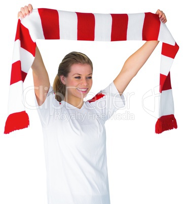 Pretty football fan in white cheering