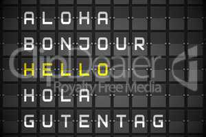 Hello in languages on black mechanical board