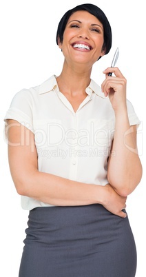 Thoughtful brown haired businesswoman in skirt