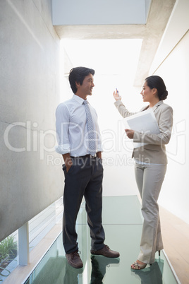 Estate agent speaking with potential buyer