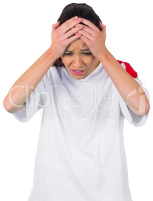 Disappointed football fan in white