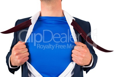 Businessman opening his shirt superhero style