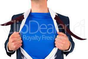 Businessman opening his shirt superhero style