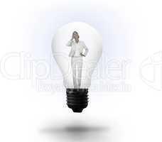Thinking businesswoman in light bulb