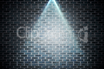 Grey brick wall under spotlight
