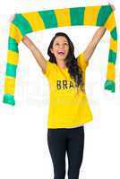 Excited football fan in brasil tshirt