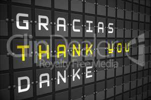 Thank you in languages on black mechanical board