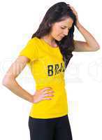 Disappointed football fan in brasil tshirt