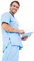 Handsome surgeon in blue scrubs using tablet pc