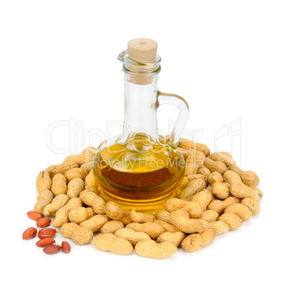 peanuts and oil in bottle isolated on white background