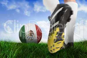 Football boot kicking mexico ball