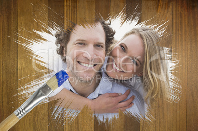 Composite image of couple smiling at camera