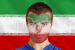 Serious young iran fan with facepaint