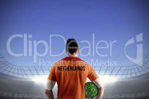 Netherlands football player holding ball