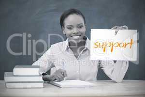 Happy teacher holding page showing support