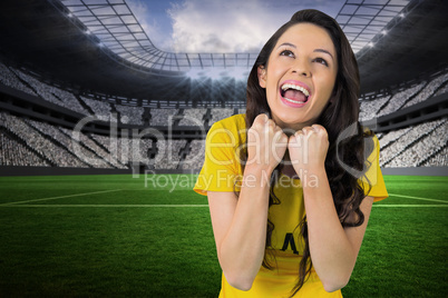 Excited football fan in brasil tshirt