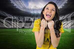 Excited football fan in brasil tshirt