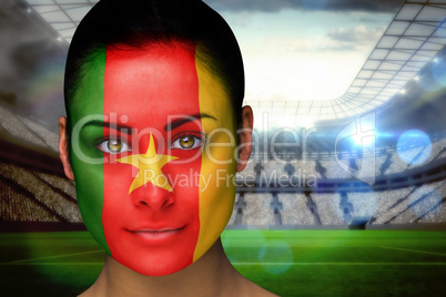 Beautiful cameroon fan in face paint Beautiful cameroon fan in face paint