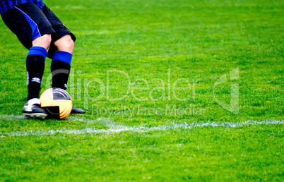 Kicking the Ball during a Football Match