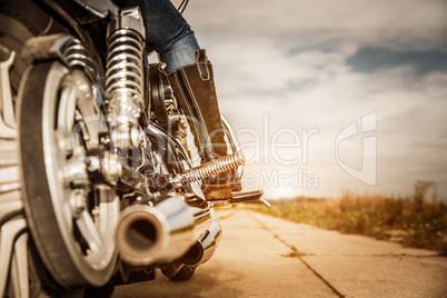 Biker girl riding on a motorcycle