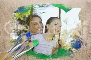 Composite image of mother and daughter in the park