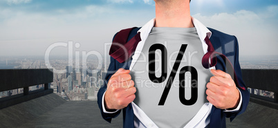 Composite image of businessman opening shirt in superhero style