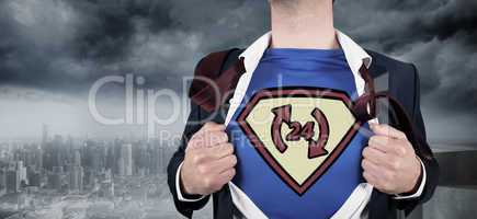 Composite image of businessman opening shirt in superhero style