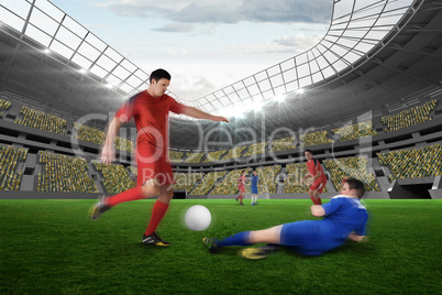 Football player in red kicking