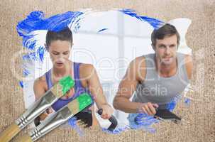 Composite image of couple working out in gym