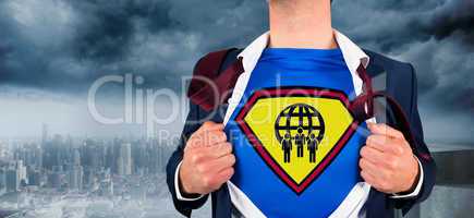 Composite image of businessman opening shirt in superhero style