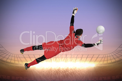 Fit goal keeper jumping up