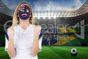 Excited australia fan in face paint cheering
