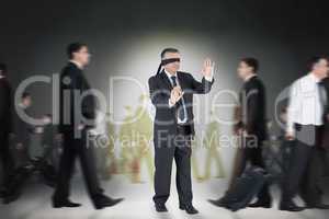 Composite image of mature businessman in a blindfold