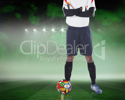 Goalkeeper standing with international ball