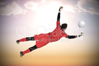 Fit goal keeper jumping up