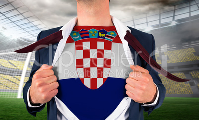 Businessman opening shirt to reveal croatia flag