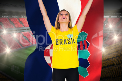 Excited football fan in brasil tshirt holding croatia flag