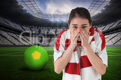 Nervous football fan looking ahead