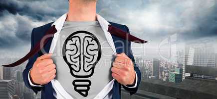 Composite image of businessman opening shirt in superhero style