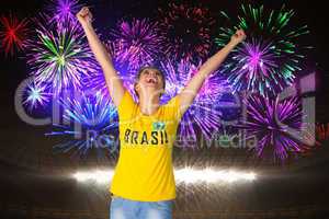 Excited football fan in brasil tshirt