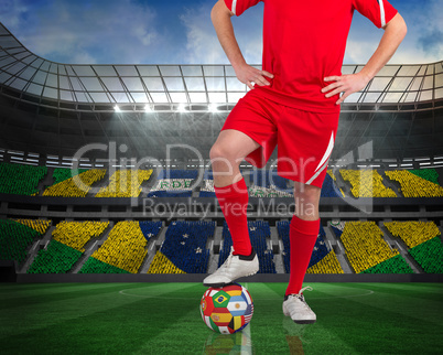 Football player standing with flag ball