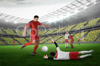 Football player in red kicking