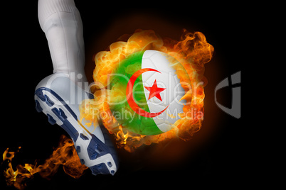 Football player kicking flaming algeria ball