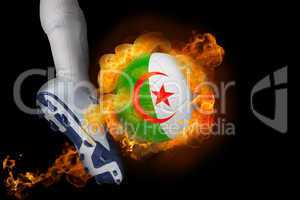 Football player kicking flaming algeria ball
