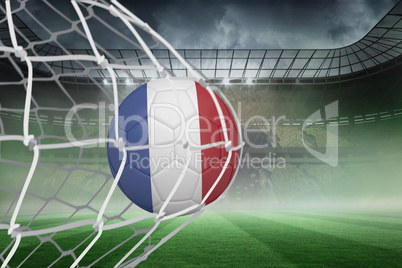 Football in france colours at back of net