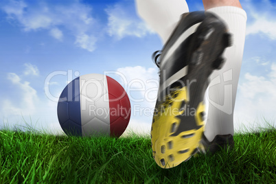 Football boot kicking france ball