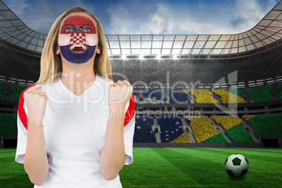 Excited croatia fan in face paint cheering